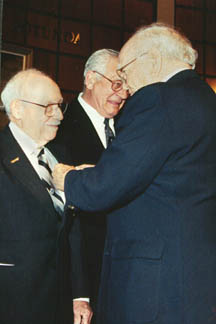 Col. Beverly Steadman presents Lou Loevsky with the D.F.C.